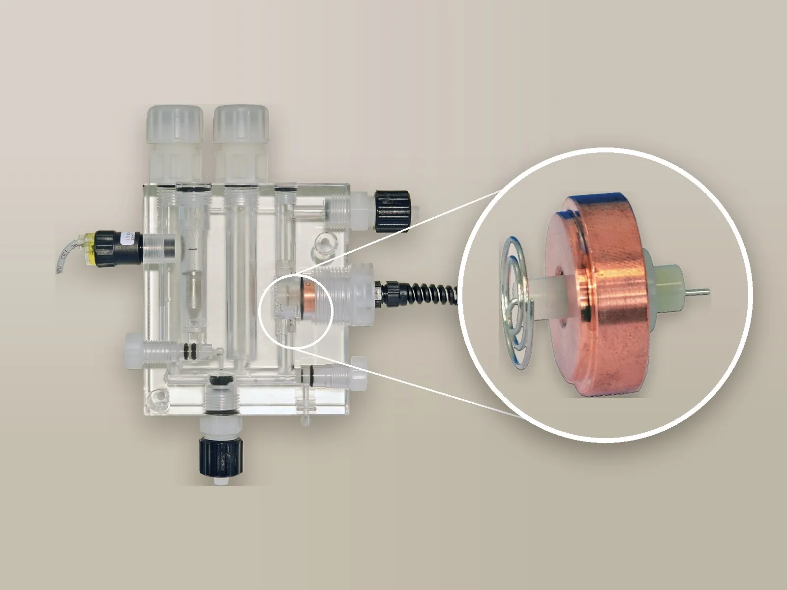 Flow-through probe holder with the ECL6 open amperometric cell and close-up of the copper electrode