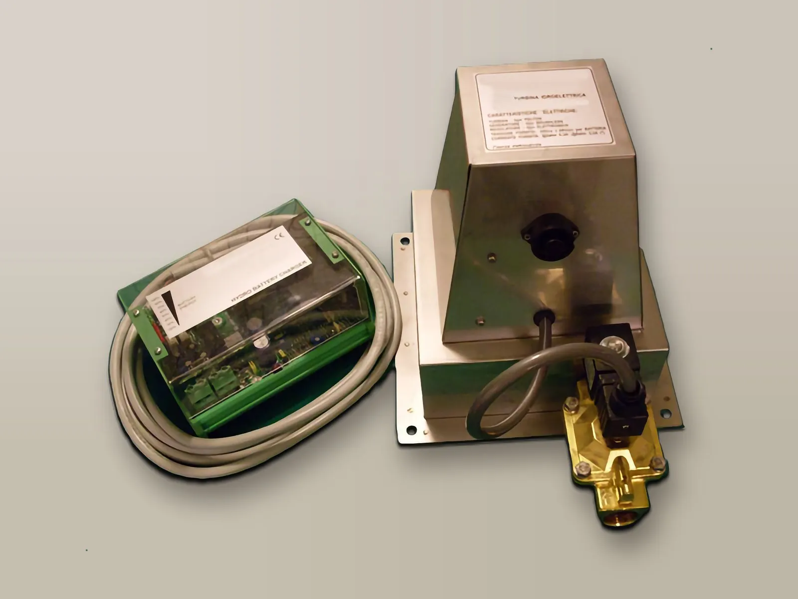 Small hydroelectric mini-turbine with charge controller and solenoid valve